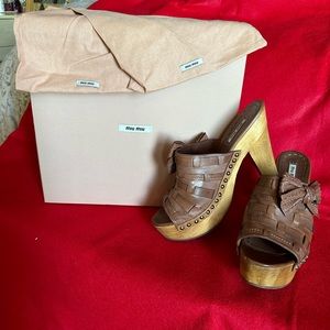 Miu Miu open toe clog slides with bows.  Size 39.5